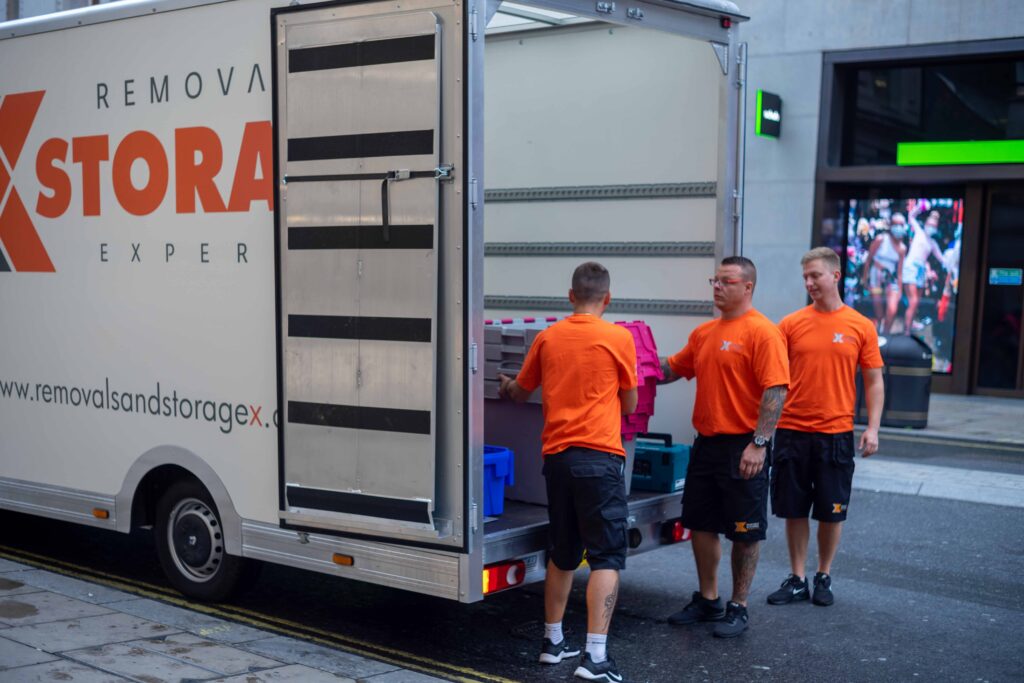 A group of professional movers arrives in central London for an office clearance.